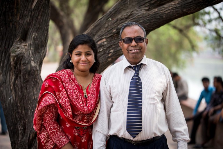Faruqul Islam Mozumder with his daugther. Faruqul has type 2 diabetes and lives in Bangladesh.